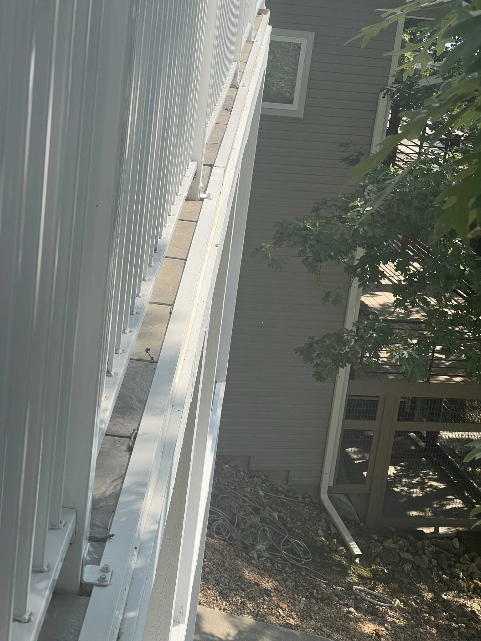 Top Mount Railing Fastened to Aluminum Edge Trim