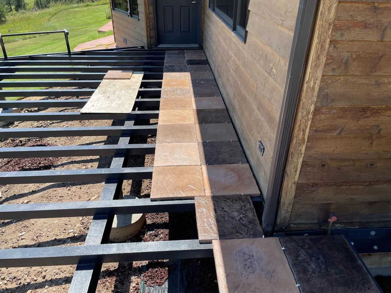 DekTek PRO Midstate Welding fabricating steel deck frame & DekTek's concrete deck tiles