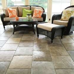 Transform your three season porch with DekTek Tile's luxury decking material. 