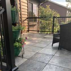 dektek tile luxury cobblestone gray concrete 