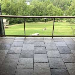 dektek tile luxury cobblestone gray concrete 