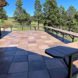 Mocha Concrete Deck Tile installed by DekTek PRO Mid State Welding in Spearfish, SD