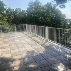 dektek tile luxury cobblestone gray concrete 